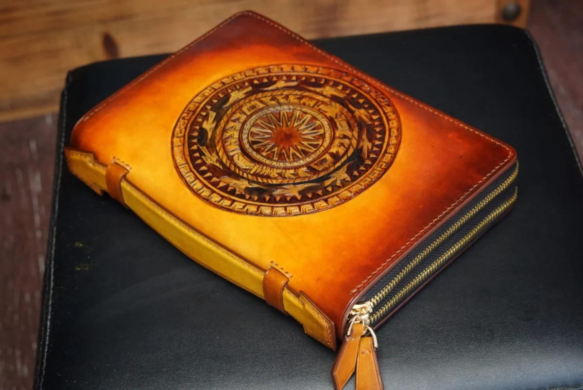 Custom Hand-Carved Dong Son Drum Leather Clutch – Saigon Leather - Image 2