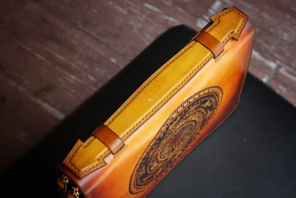 Custom Hand-Carved Dong Son Drum Leather Clutch – Saigon Leather - Image 3