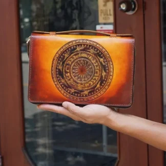 Custom Hand-Carved Dong Son Drum Leather Clutch – Saigon Leather