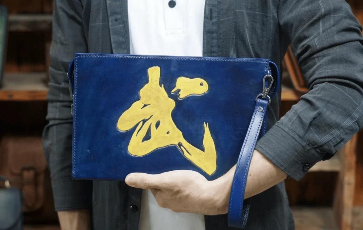 Saigon Leather’s Hand-Carved Dual-Sided Leather Handbag – Buddha & Demon Warrior - Image 6