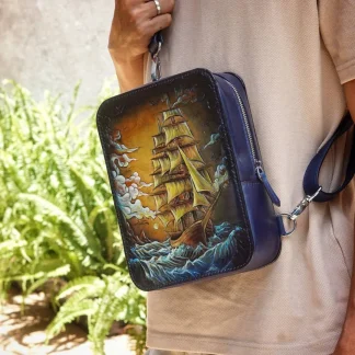 Saigon Leather’s Monaco Chest Bag – Hand-Dyed Leather with Sailboat Carving for Smooth Sailing