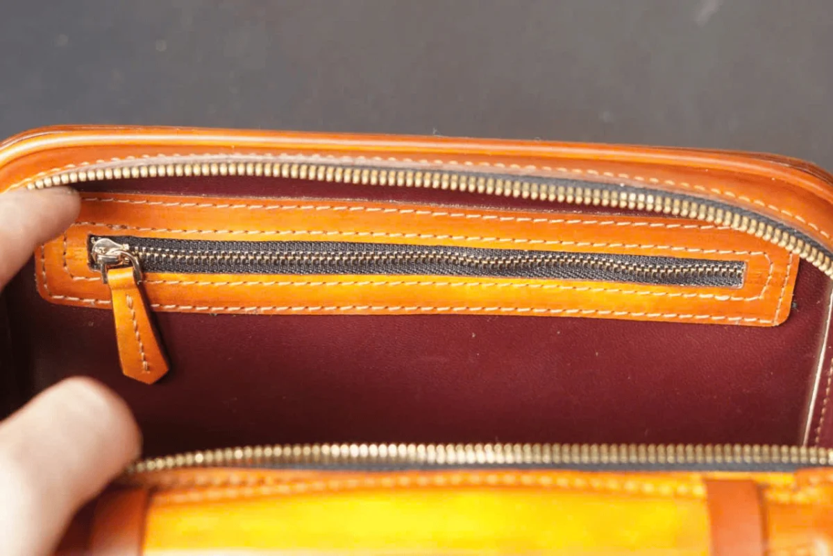 Saigon Leather’s Lucky Maneki Neko Full-Grain Leather Bag with Lotus Detailing - Image 9
