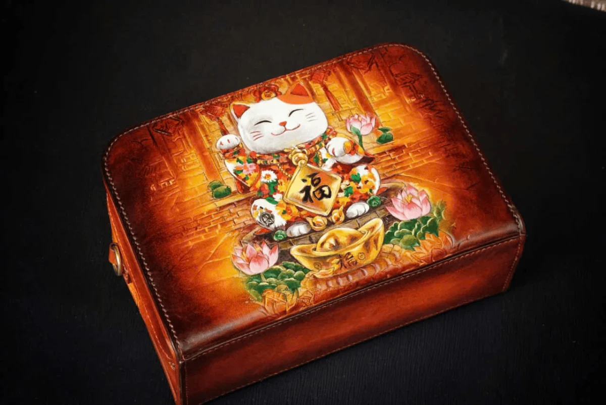 Saigon Leather’s Lucky Maneki Neko Full-Grain Leather Bag with Lotus Detailing - Image 4