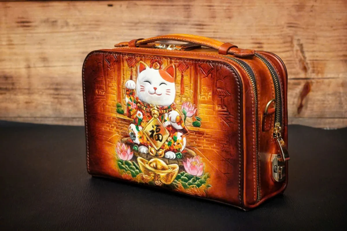 Saigon Leather’s Lucky Maneki Neko Full-Grain Leather Bag with Lotus Detailing - Image 3