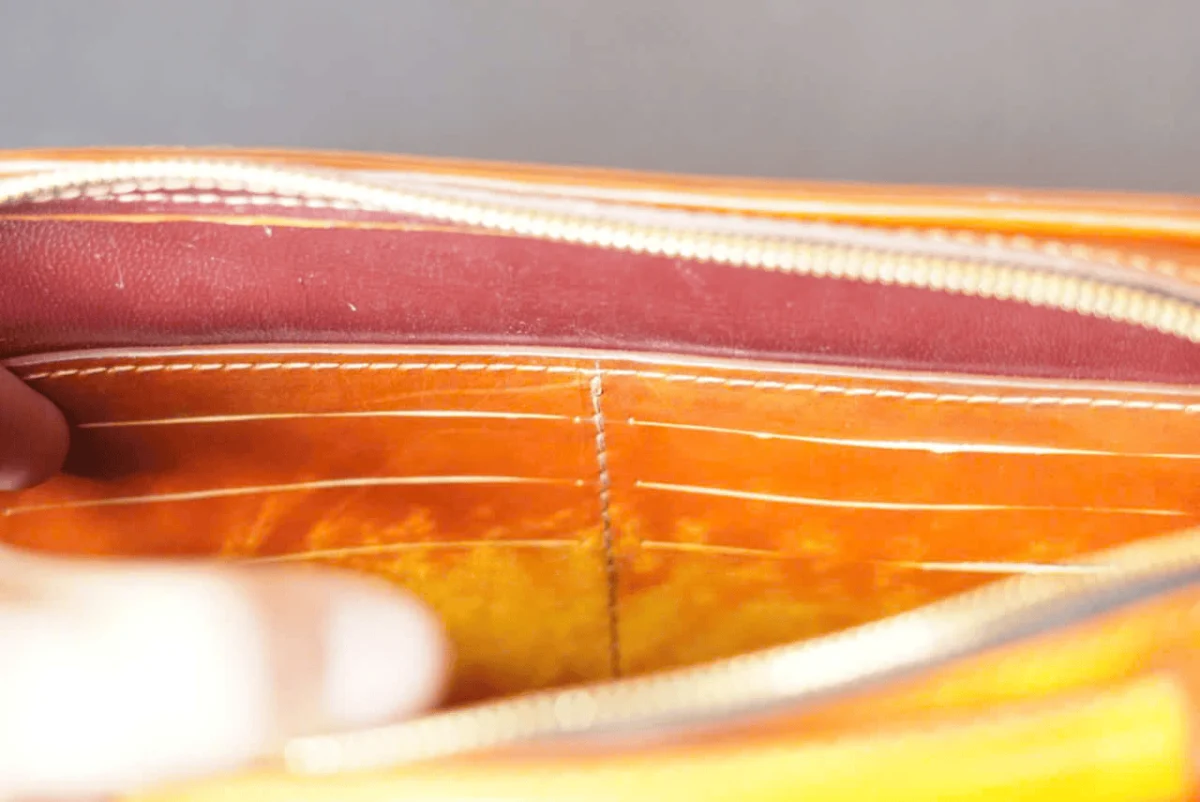 Saigon Leather’s Lucky Maneki Neko Full-Grain Leather Bag with Lotus Detailing - Image 10
